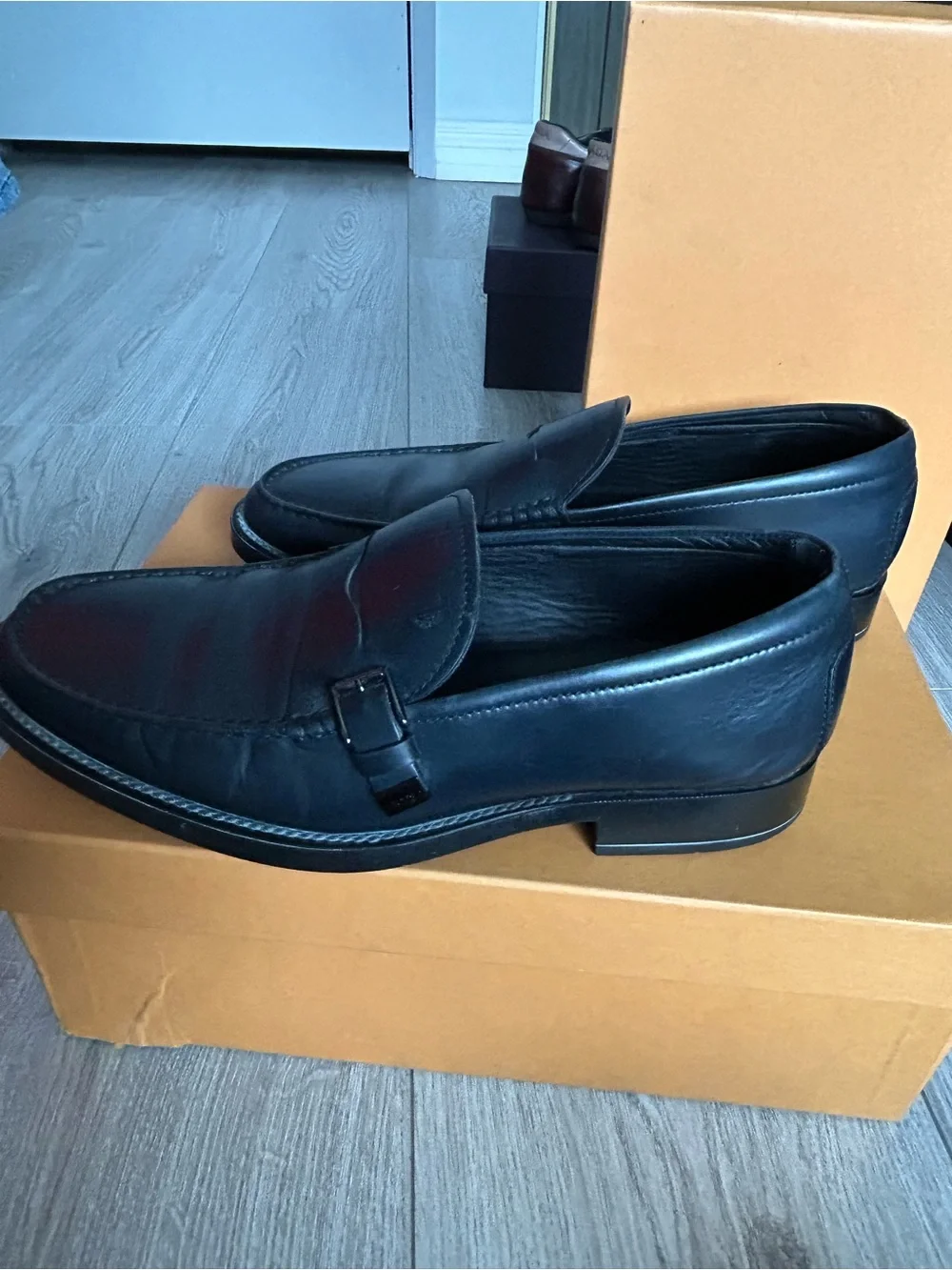 Tod's Black Leather Penny Loafers